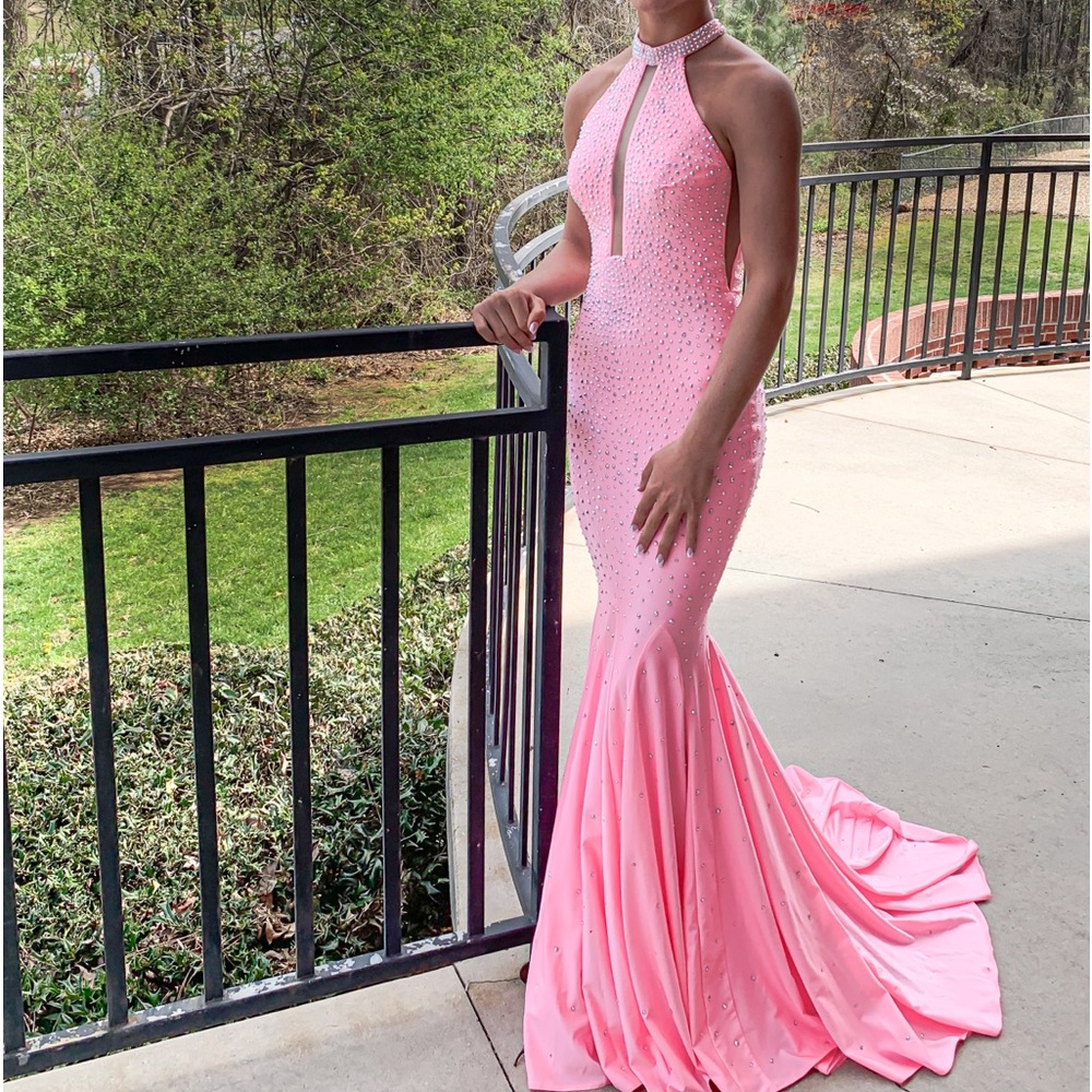 Hi, I am selling this stunning dress from McKenzie Jade’s.